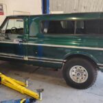 Green 1972 Chevy C20 Classic in the shop