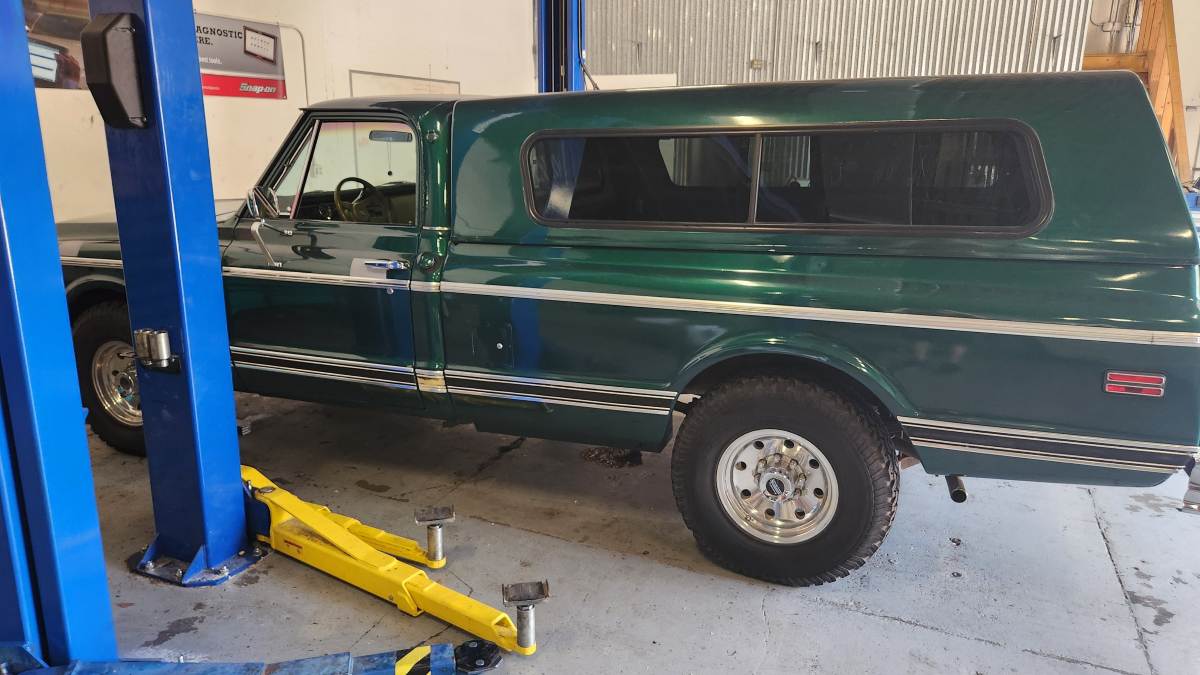 Green 1972 Chevy C20 Classic in the shop
