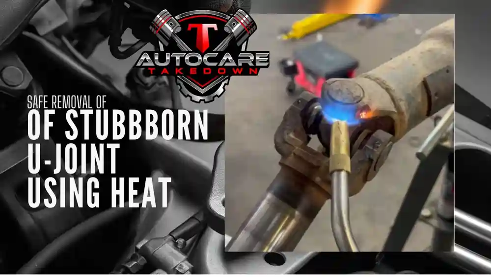 decorative image showing mechanic using torch to remove stubborn u-joint